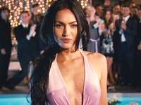 Megan Fox exposing boobs through totally wet dress