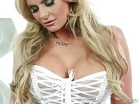 Gorgeous Phoenix Marie is posing for you in hot white lingerie.